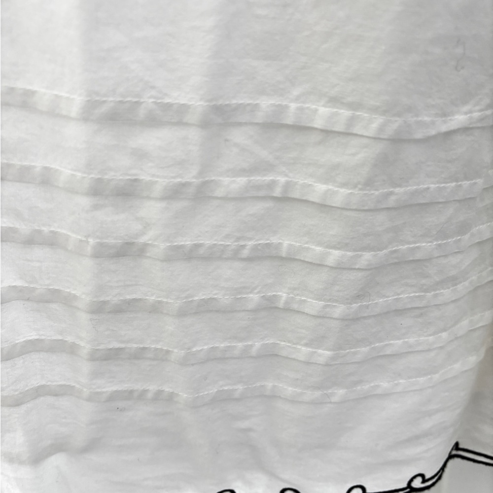 White and black midi dress